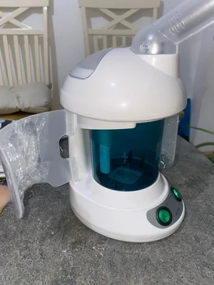 Customer photo of the steamer unboxed on a table