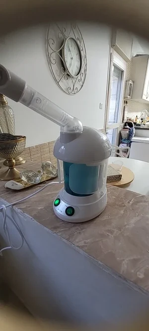 Customer photo of the steamer set up on a kitchen counter